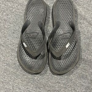 Black Nike sandals, size 9